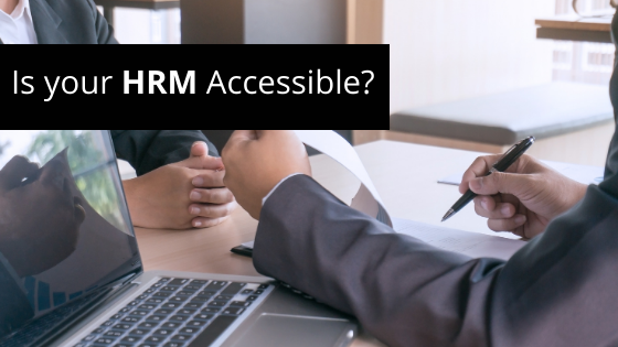 two people sitting across the table. Text: Is your HRM Accessible?