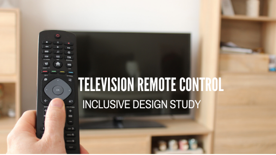 A television remote in a persons hand pointed at a television in the background. Television Remote Control - Inclusive Design Study